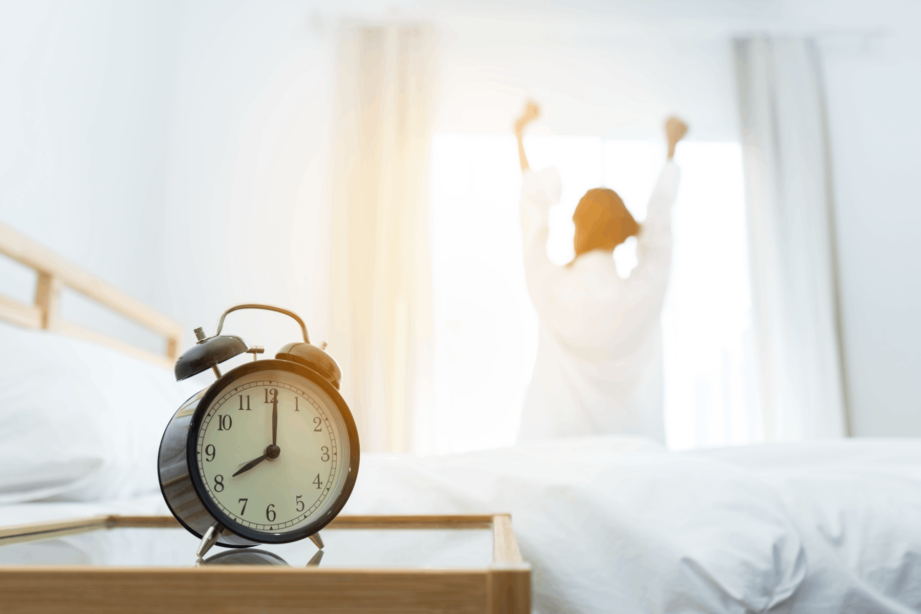 Alarm clock shows 8 o'clock in the morning